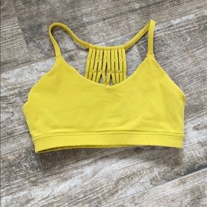 Glyder Sports Bra! Mustard Yellow. Strap it back.